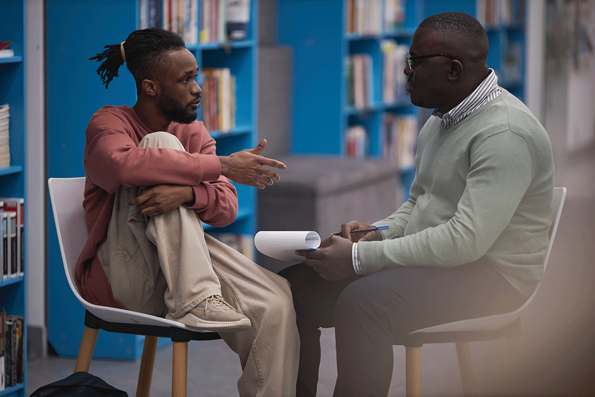 a counselor at an entry level behavioral health job works with a client