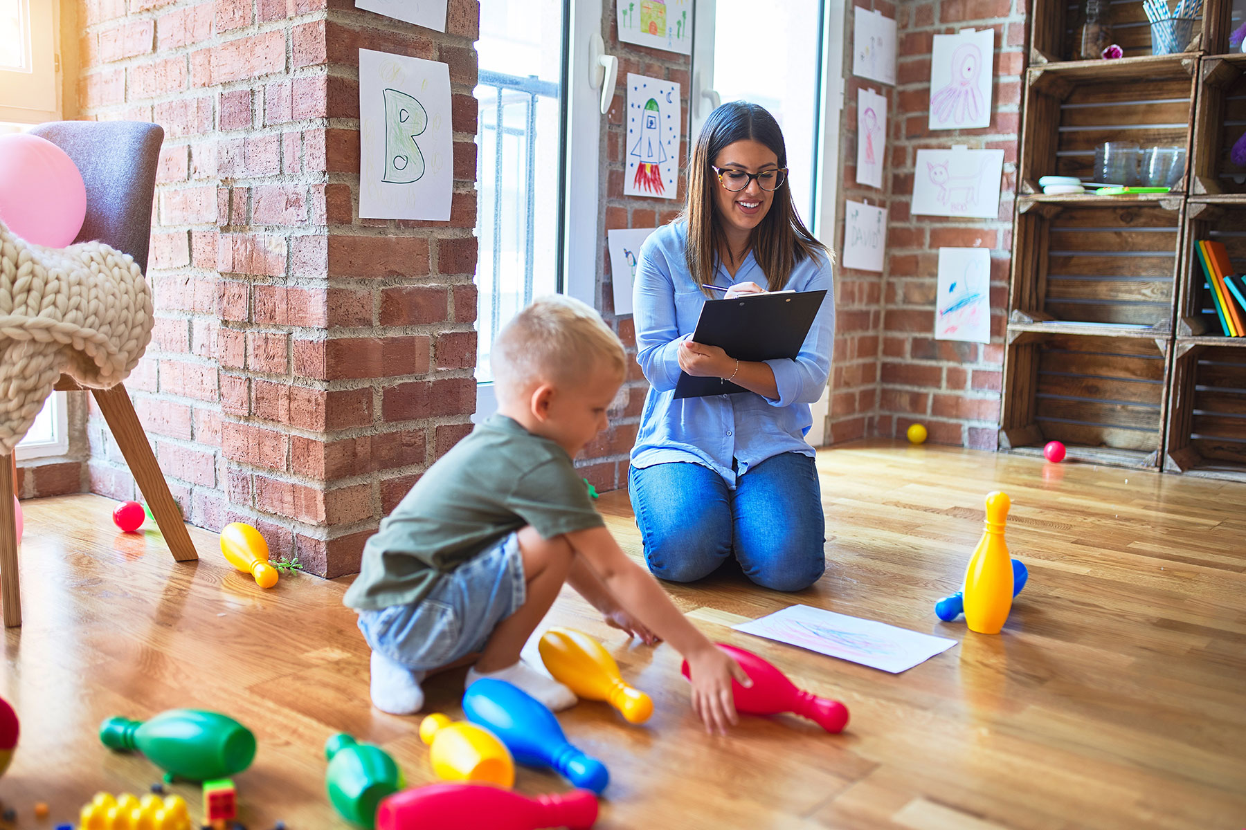 a social worker works with a small child