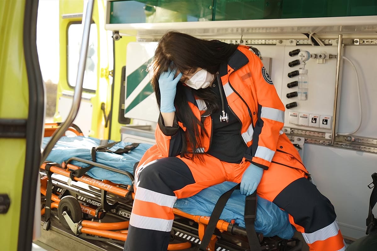 a firefighter sits sadly possibly demonstrating a link between first responders and addiction