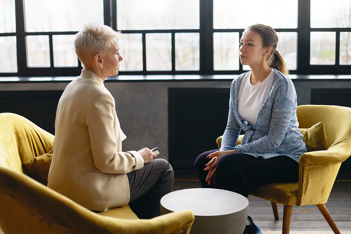 two people talk possibly discussing what is psychotherapy