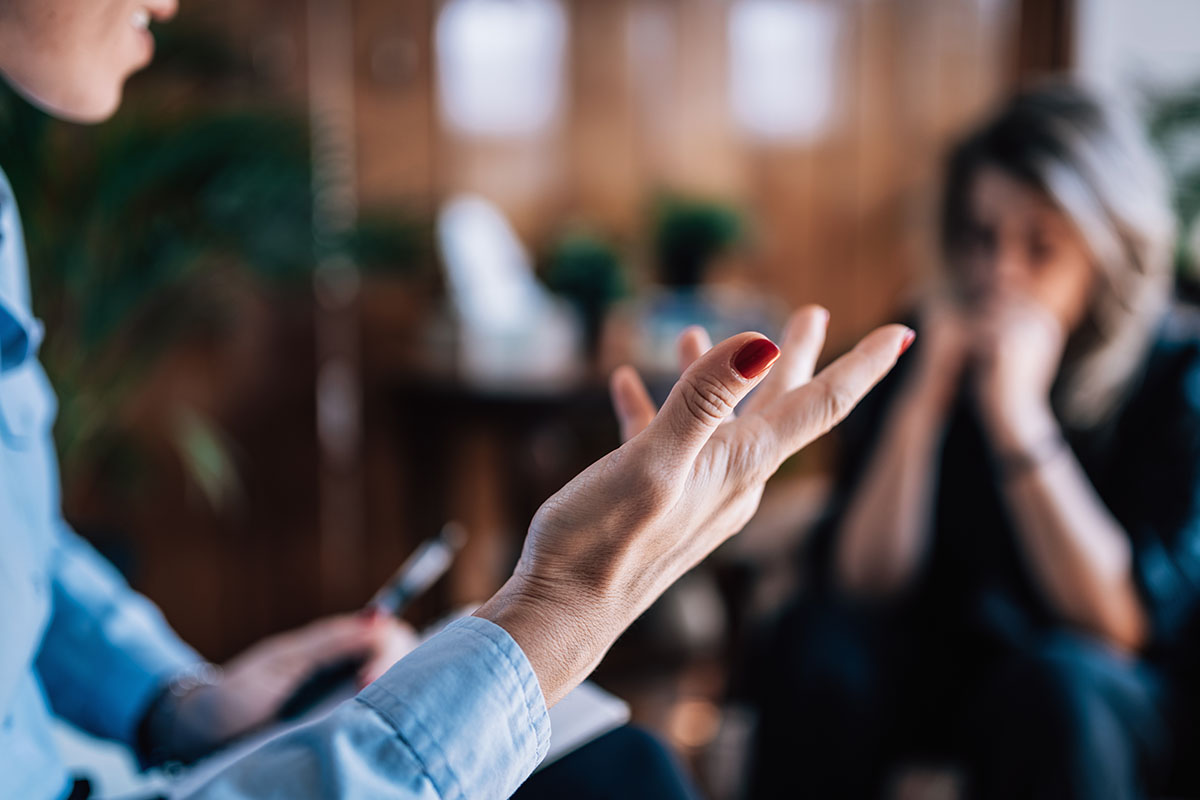 a behavioral therapist talks to a person