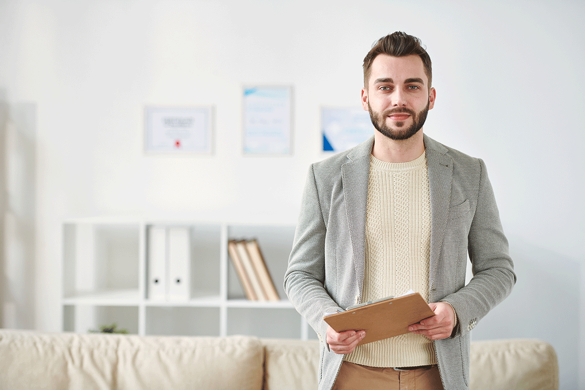 a man is happy with and proud of his decision to become a licensed and certified therapist