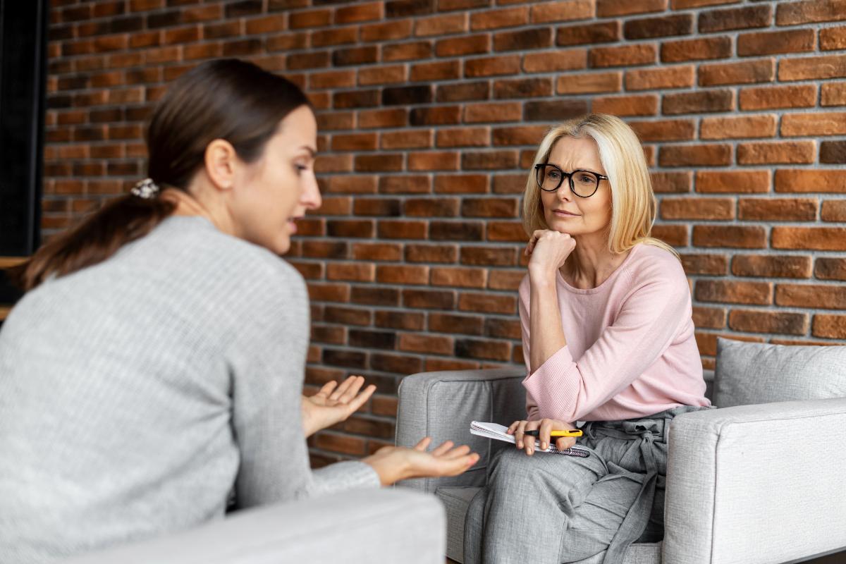 a woman performs her job duties in her new role as a psychiatric technician