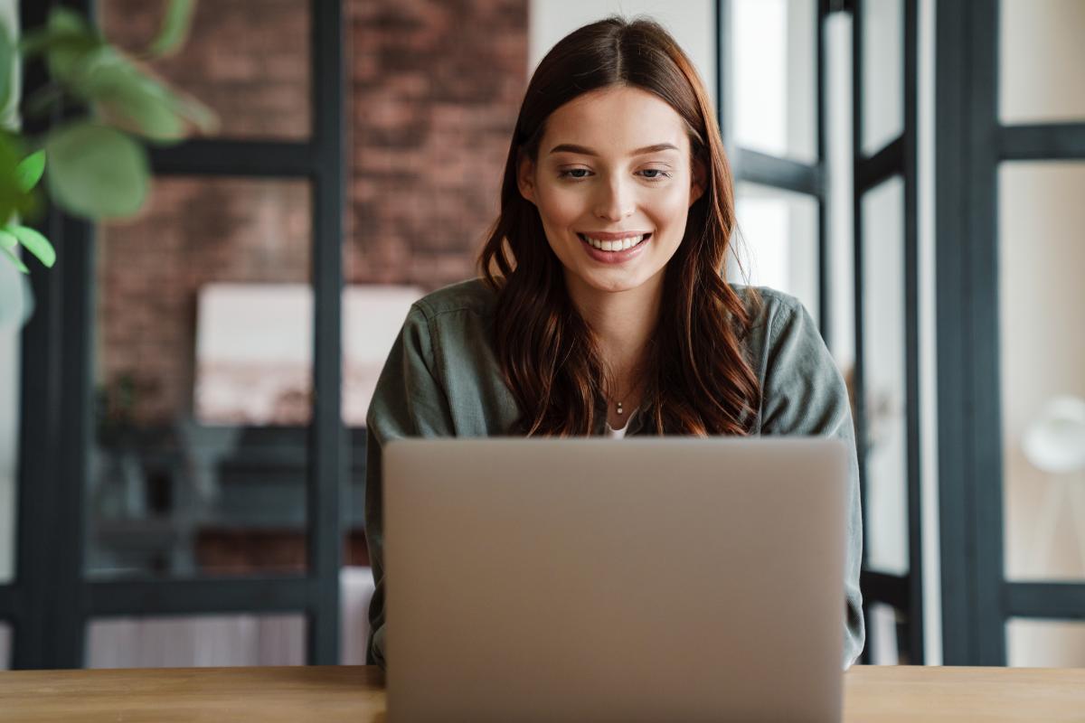 a woman finds ways to increase her productivity when working remotely