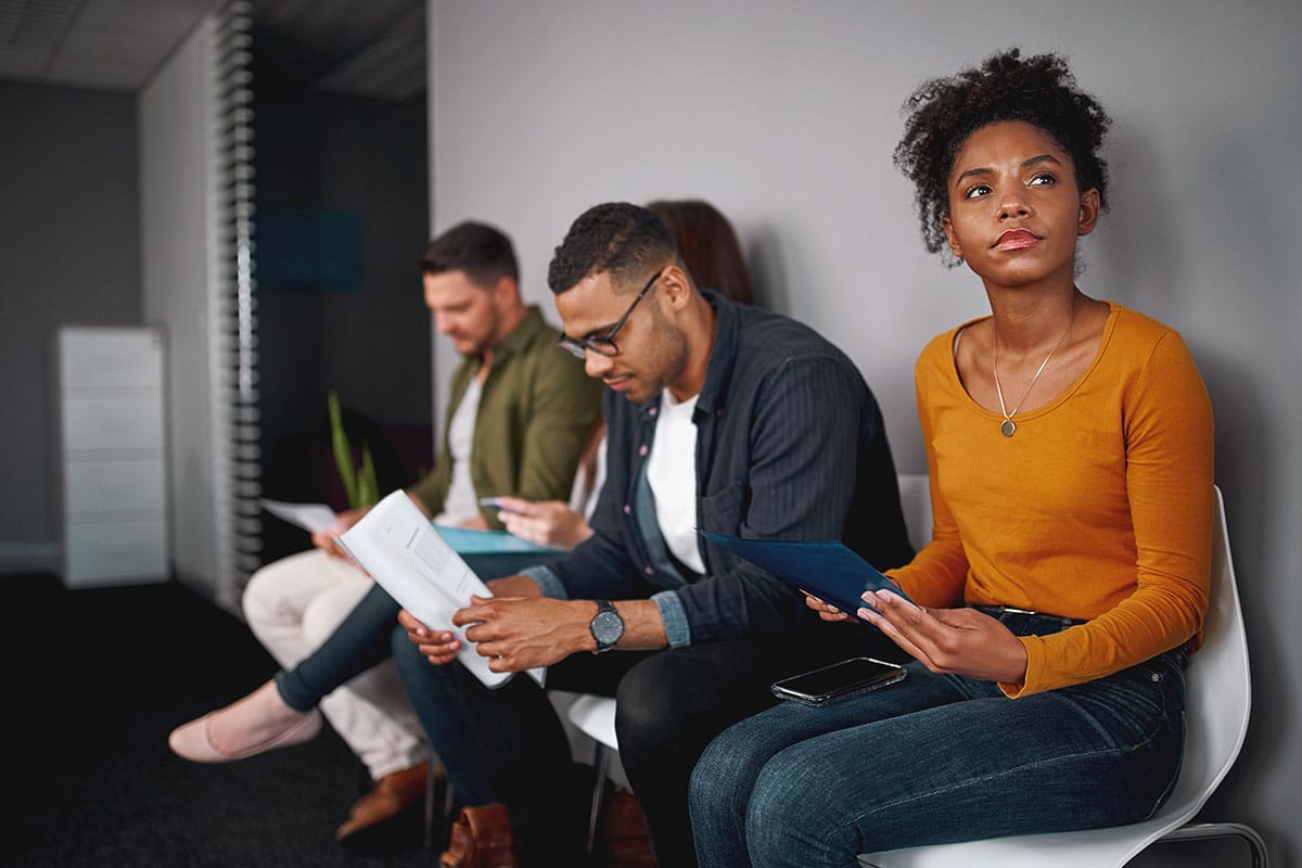 recent college grads prepare to interview for a job