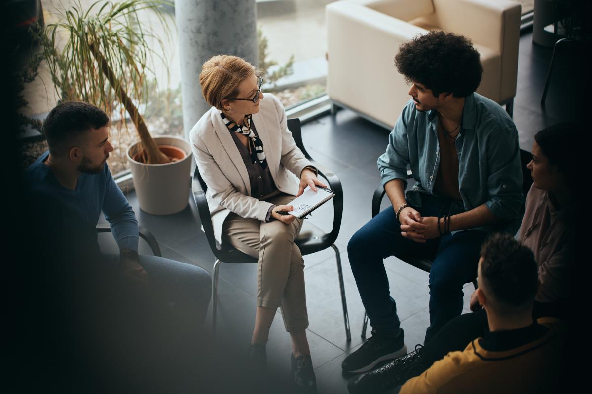 a substance abuse counselor meets with a client