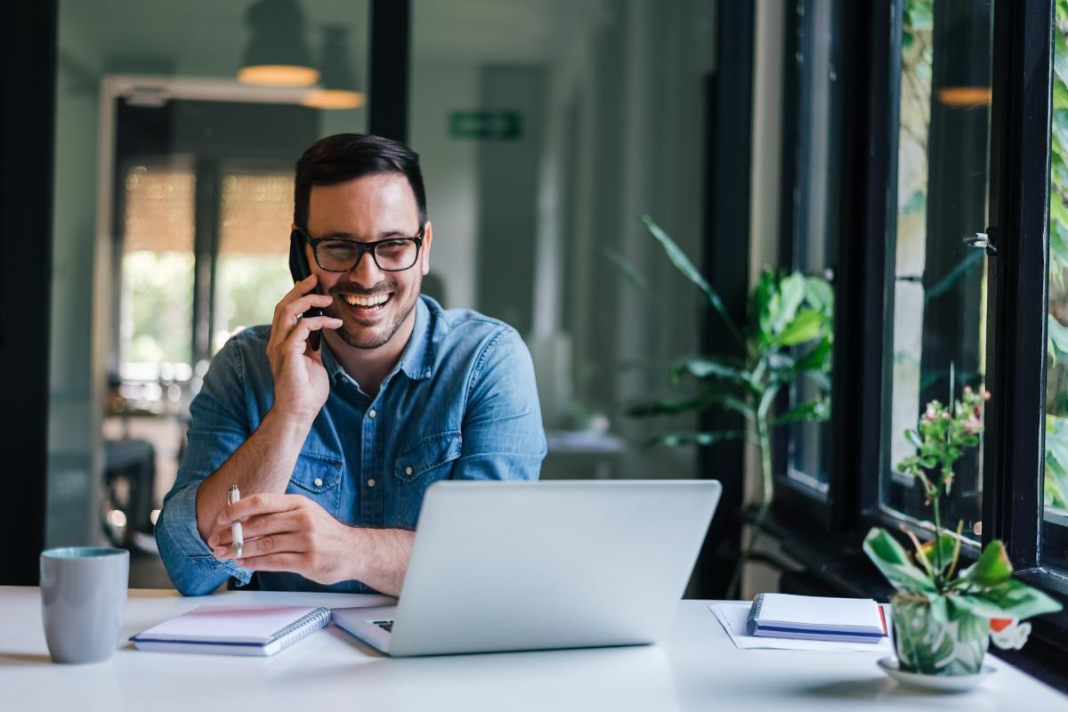 a man enjoys his new career path as a remote health specialist