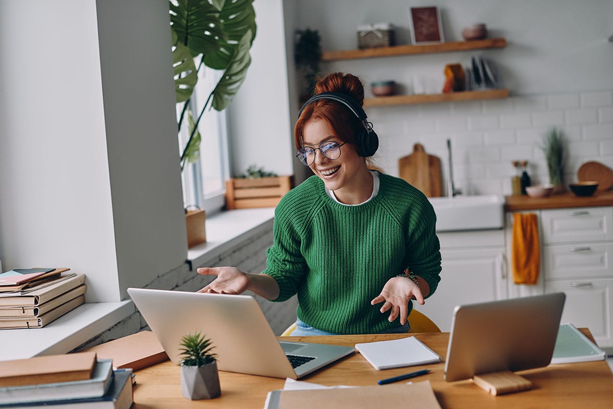 a woman enjoys the benefits of working a remote job