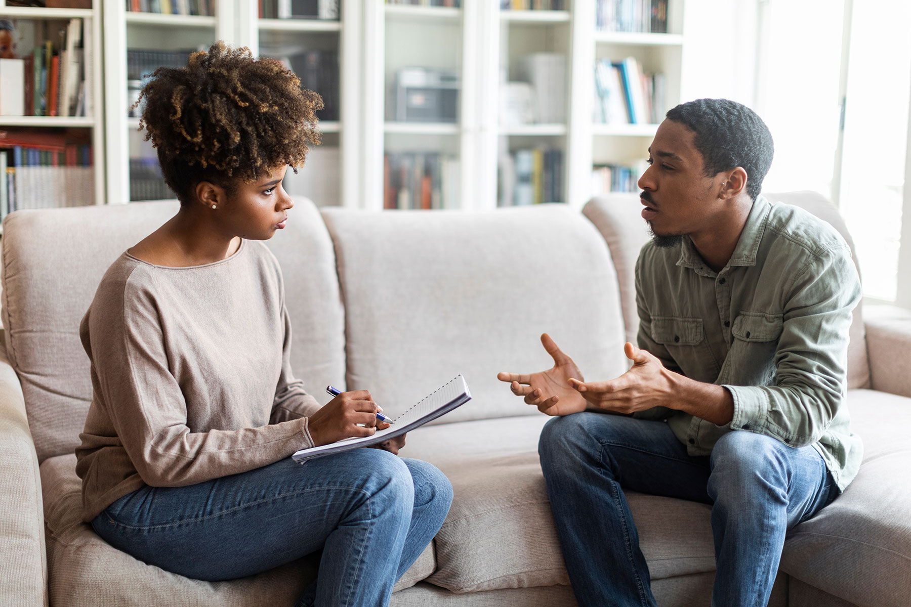 a mental health coach works with a client